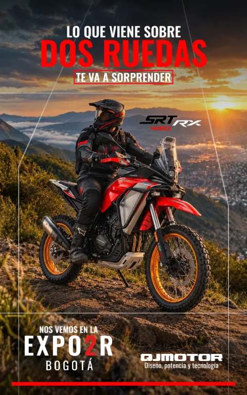 Pieza de campaña de QJ Motor: un motociclista conduce una SRT 450 RX por un camino de montaña al atardecer, sobre una ciudad. El texto anuncia la presencia de la marca en la Expo 2R de Bogotá.